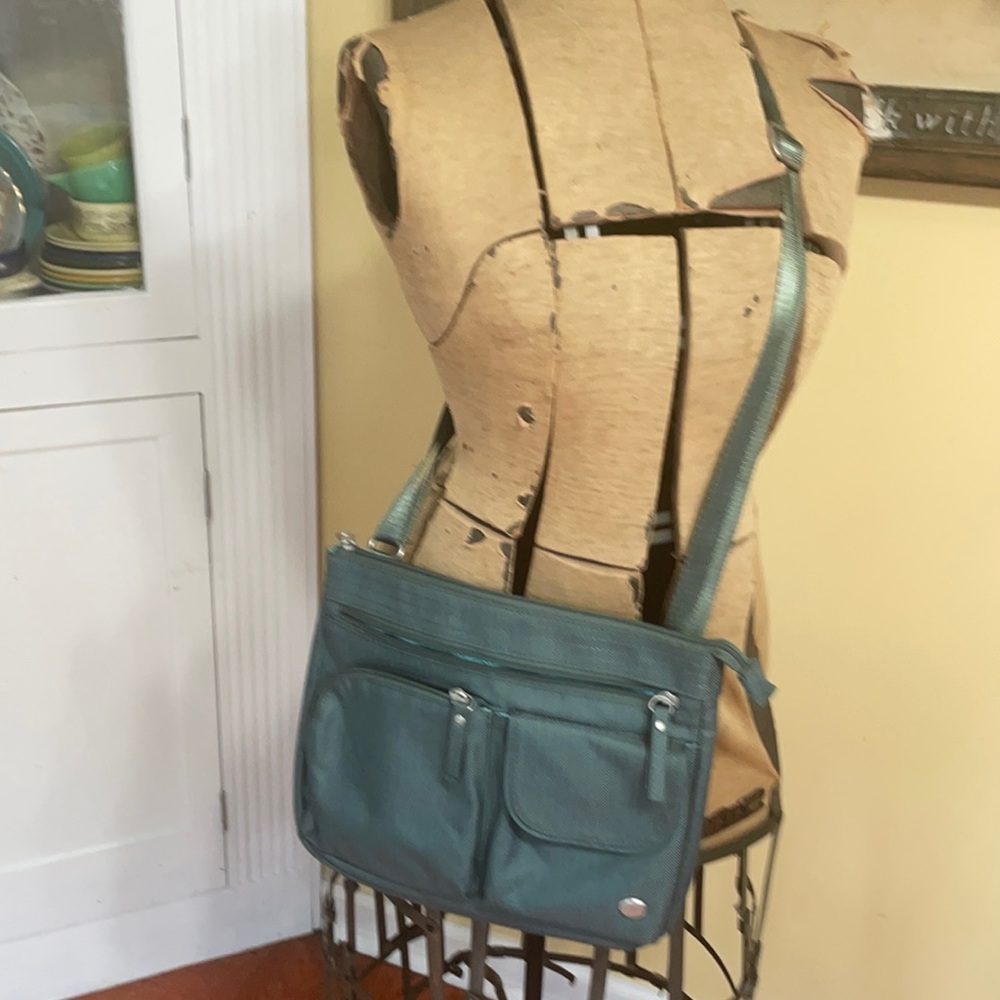 Haiku crossbody bag teal travel EUC